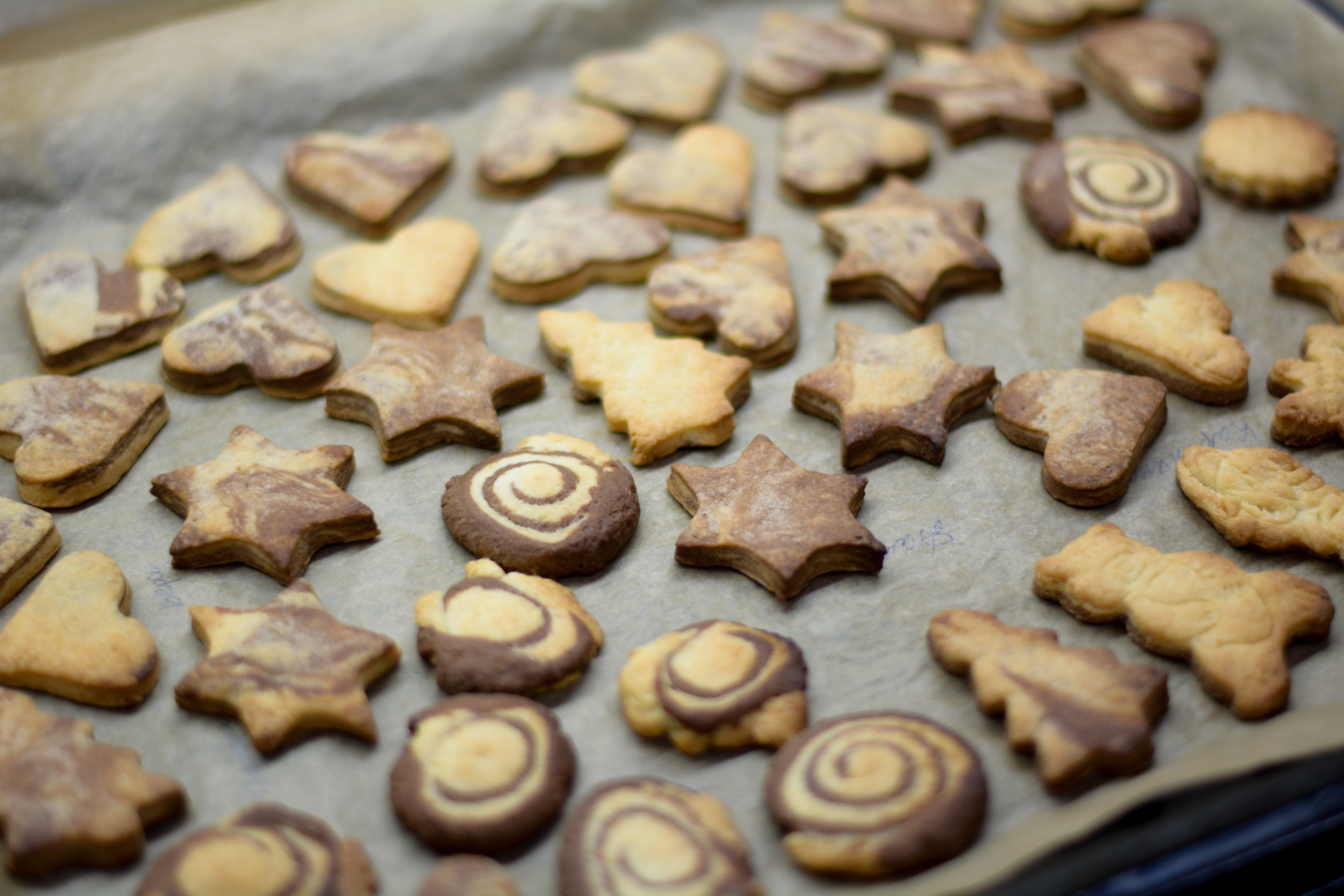 different shaped cookies in a tray image